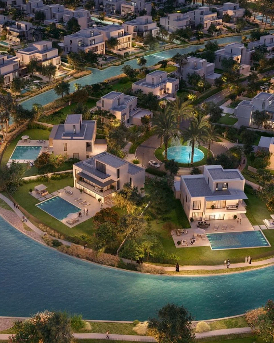 Exterior view of The Oasis by Emaar showcasing modern architecture and green spaces